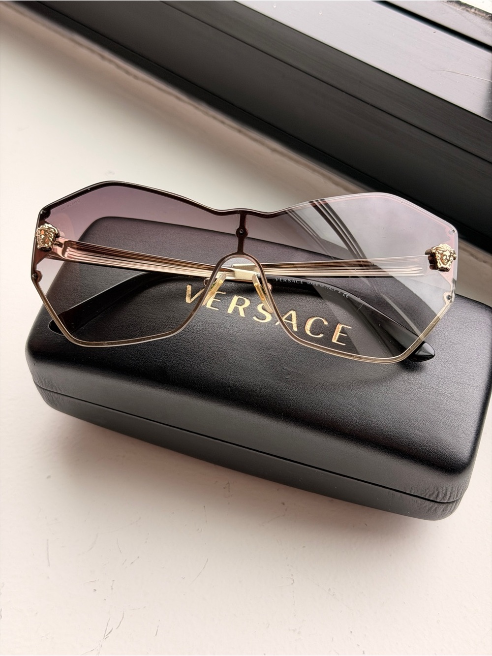 Versace Women's Pink Gradient Rimless Sunglasses with Gold Accents